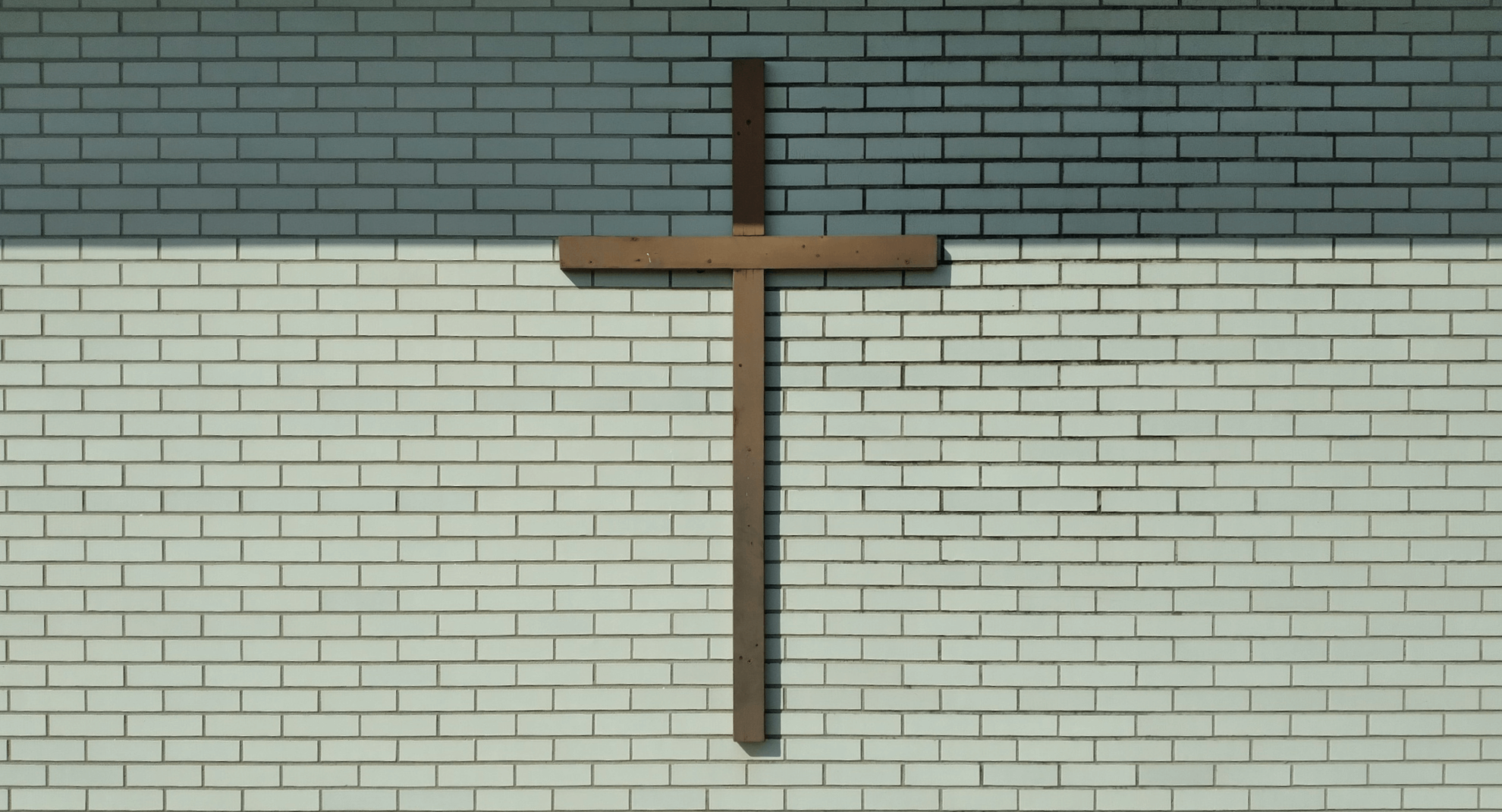 A wall with a cross on it.